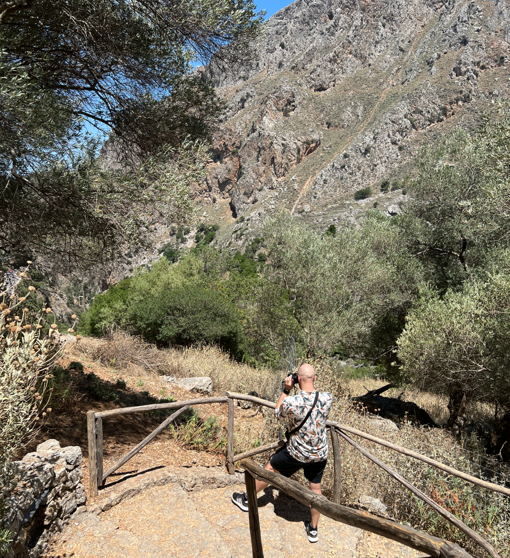 Kamil taking photos in a canyon